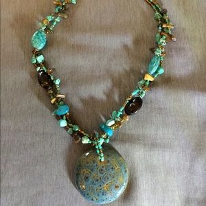 Turquoise beaded necklace with pendant